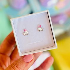 Enchant your sweet girl's day with these 925 sterling silver bunny stud earrings that are almost as delightful as she is. This fun design features an adorable white and pink enamel bunny on each stud, she will love wearing them. Because they are crafted with the best material, they will not lose their shine and she will have them in her collection for many years. They are great for birthdays or just because gifts, stylish and safe for her sensitive ears. Pick up a pair for that special girl you Pink Sterling Silver Earrings For Birthday, Whimsical Silver Earrings For Birthday, White Sterling Silver Earrings For Birthday, Playful Sterling Silver Earrings, Hopping Bunny, Jewelry Post, Kids Earrings, Kids Necklace, Special Girl