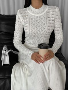 White knitted midi dress with an openwork top will complement an elegant feminine look!  The dress is made of cotton and viscose yarn, pleasant to the touch and to the body, the pleated maxi skirt and long sleeves add style to the look.  The dress is perfect for special occasions, weddings, romantic dates, anniversaries, family celebrations and more, also complementing the dress with a blazer for a casual look for every day, office or business meetings.   DETAILS - white   - premium yarn  - 50% cotton, 50% viscose - embroidered - midi length  - fitted - hollow out top  - pleated skirt   SIZES This dress is available in 2 sizes S-M and M-L  Size  XS - S  bust 84-88cm = 33.08-34.64 inches,  waist 63-67cm = 24.8 - 26.37 inches  hips 92-96 = 36.22-37.80 inches. M-L BUST 36-37.7 inches / 92-96 Elegant Open Knit Crochet Dress For Spring, Elegant Stretch Crochet Dress For Spring, Elegant Spring Stretch Crochet Dress, Elegant Spring Crochet Dress With Stretch, Elegant Crochet Dress With Pointelle Knit, Elegant Midi-length Open Knit Crochet Dress, Elegant Midi Length Open Knit Crochet Dress, Elegant Midi-length Crochet Dress With Pointelle Knit, Elegant Fitted Crochet Knit Dress