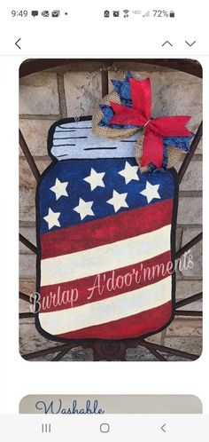 a patriotic door hanger with an american flag on it