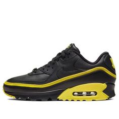 Nike Air Max 90 Undefeated Black Optic Yellow CJ7197-001 Black Leather Nike Air Max With Round Toe, Black Leather Nike Air Max Low-top Sneakers, Black Leather Low-top Nike Air Max, Black Leather Nike Air Max, Casual Black Nike Air Max, Nike Air Max Dynamic Black Synthetic Shoes, Nike Air Max Black Dynamic Synthetic Shoes, Black Nike Air Max Dynamic Style, Nike Air Max Black Synthetic For Sports