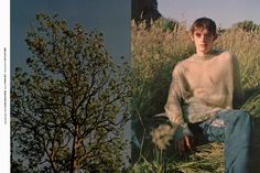 a man sitting in the grass next to a tree and another photo of him wearing a sweater