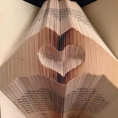 the folded book is shaped like a heart