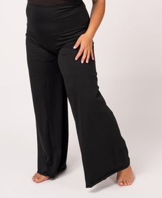 Life is easier when you go with the flow... With a comfortable, extra long roll-top waist, and made of soft organic cotton fabric, you'll naturally relax each time you wear these amazing flowy pants. Our flowy pants feature an overlock decorative stitch on the bottom edge   (versus a traditional rolled-hem). This lightweight seam creates a slight roll of the fabric at the bottom. Relax and just go with the flow in these boho palazzo pants! Black Versatile Long Pants For Relaxation, Black Cotton Bottoms For Relaxation, Relaxed Fit Yoga Pants With Wide Waistband For Loungewear, Versatile Wide Leg Pants For Relaxation, Black Wide Leg Bottoms For Relaxation, Black Relaxed Fit Pants For Relaxation, Black Relaxed Fit Casual Pants, Black Full-length Yoga Pants For Relaxation, Black Wide-leg Yoga Bottoms