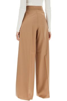 Find MAX MARA Wide-leg Cool Wool Trousers 'r on Editorialist. These Max Mara trousers are inspired by tailoring and made from lightweight cool wool fabric. The wide cut is enhanced by a high waist with front pleats. They feature a hidden zip closure, button and hook fastening at the waistband, and side pockets in the French style. Finished with tailored stitching and an unhemmed bottom for a refined look. The model is 177 cm tall and wears an IT size 38. Spring Wool Wide Leg Workwear Pants, Wool Wide Leg Pants For Workwear In Spring, Spring Wool Wide Leg Pants For Workwear, Spring Wool Straight Pants, Full Length Wool Pants For Spring, Spring Wool Wide-leg Pants, Wool Full Length Pants For Spring, Full-length Wool Bottoms For Spring, Wool Full-length Bottoms For Spring