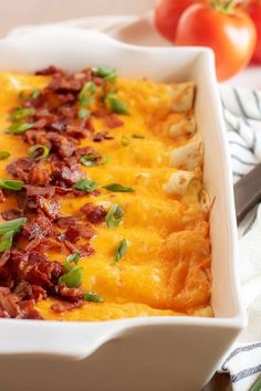 a casserole dish filled with bacon and cheese