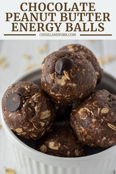 chocolate peanut butter energy balls in a white bowl with oats on the side and text overlay