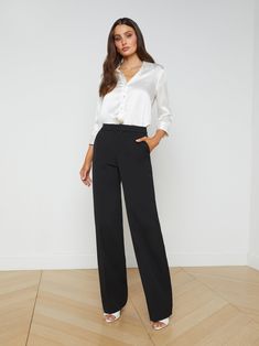 Our favorite straight-leg pant, now in versatile black. With a touch of comfortable stretch, the Livvy trouser hugs from contoured waistband to upper thigh, then releases into a full straight leg for a balanced silhouette. Understated slit pockets and hidden closures blend seamlessly into the design. Pair with an elegant silk blouse and heel for the perfect office-to-dinner look. | L'AGENCE Livvy Straight-Leg Trouser In Black Closet Rebuild, Hoi An Tailor, Selena Dress, Liquid Fabric, Leg Pants Outfit, Black Shirts Women, Black Bottom, Modern Minimalist Design, Black Slacks