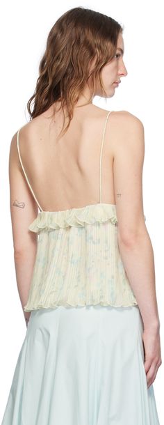 Recycled polyester georgette camisole. Pleats and floral pattern printed throughout. · Plunging V-neck · Ruffled trim at chest · Adjustable spaghetti straps · Button closure and keyhole at back Supplier color: Tofu Floral Camisole, Floral Prints Pattern, Neck Ruffle, Ruffle Trim, Spaghetti Strap, Floral Pattern, Print Patterns, Spaghetti, Off White