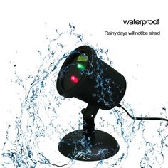 a waterproof camera with red and green lights on it's side in the water