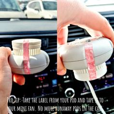 a person is plugging in to a car's air freshener dispenser