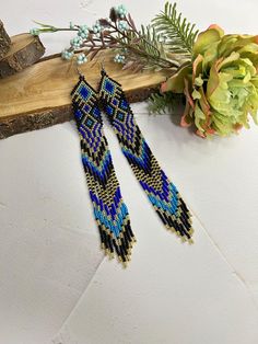 Long earrings made of gold and blue beads. Made from Czech beads. Length 7.2 inches (18cm) Width 0.8 inches (2 cm) Hypoallergenic clasp. Native Earrings, Earrings Drop, Earrings Long, Earrings Boho, Czech Beads, Fringe Earrings, Blue Beads, Long Earrings, Boho Earrings