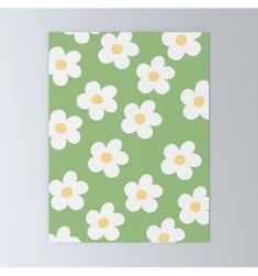 a green and white flower pattern with yellow centers on the petals canvas wall art print