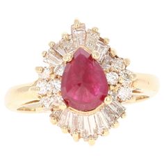 This ring has a pretty pear cut Ruby that weighs 1.40 carats and has 12 round cut diamonds that weigh 0.32 carats, (clarity: VS, color: H) and 14 baguette cut diamonds that weigh 0.77 carats, (clarity: VS, color: H) The Pear Cut Ruby measures at approximately 8 mm x 6 mm and is Heated as per industry standards. It is set in 14 karat yellow gold and weighs approximately 4.7 grams. The ring is a size 7 and can be re-sized free of charge. Fine Jewelry Pear-shaped Ruby Ring With Diamond, Diamond Ruby Ring With Prong Setting In Pear Shape, Pear-shaped Ruby Ring With Diamond, Pear-shaped Ruby Ring With Diamond Halo Setting, Pear-shaped Ruby Ring With Diamond Halo, Classic Pear-shaped Brilliant Cut Ruby Ring, Classic Pear-shaped Ruby Ring With Center Stone, Classic Pear-shaped Ruby Ring With Prong Setting, Formal Pear-shaped Brilliant Cut Ruby Ring