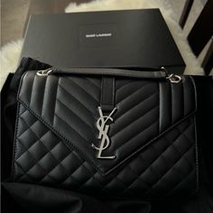 Used But Excellent Condition! See Photos For Details. Comes With Box And Dust Bag And Authenticity Cards. Envelope Bag Ysl, Medium Bag, Envelope Bag, Saint Laurent Bag, Silver Accents, Medium Bags, Silver Hardware, Embossed Leather, Emboss