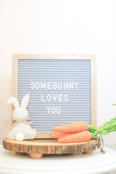 some bunny loves you carrots and a sign