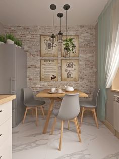 a kitchen with a brick wall and wooden table surrounded by gray chairs in front of it