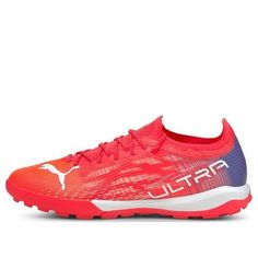 the puma ultra speed running shoe in red and blue with white lettering on the upper part