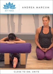 two people sitting on yoga mats in front of a wall with the words, close to om