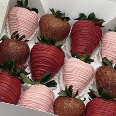 a box filled with lots of chocolate covered strawberries