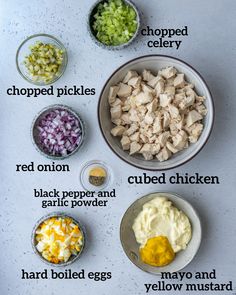 the ingredients for chicken salad laid out in bowls