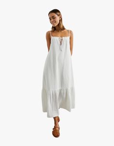 Simplify your dressing routine with the Marseille Dress. Designed with a flowy silhouette, a drawstring neckline, and a cute ruffled hem, this piece is the perfect casual dress for any occasion. Spend your summer in this piece! Mother Knows Best, Drawstring Neckline, Blouse Tank Top, Summer Maxi, Wedding Night, Everyday Dresses, Bag Dress, White Summer, Sweater Skirt