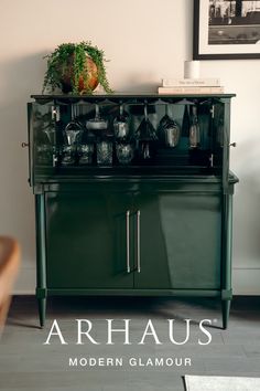 a green cabinet sitting in the corner of a room