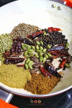 spices and seasonings in a pan on the stove