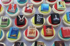 many cupcakes are decorated with books on them