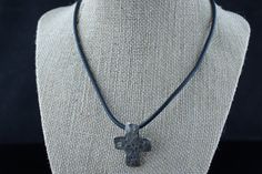 This is the perfect option for those who like cool, unique jewelry and the luxury, shine of black, silver. This necklace is well made, cute and/or elegant in design, and very desirable. The necklace is choker . The necklace and cross made of leather, and sterling silver. The necklace has pendant/charm. The pendant have shape of cross. The clasp is in good working condition. The clasp is lobster. ♥ Age/era: Circa 1970s - 1980s. ♥ There is a hallmark . 925. ❤️ The necklaces are about 16 inches lon Black Cross Necklace As Gift, Black Cross Pendant Necklace For Gift, Black Cross Pendant Necklace Gift, Handmade Adjustable Black Cross Necklace, Handmade Black Crucifix Necklace, Adjustable Black Cross Pendant Jewelry, Black Adjustable Cross Pendant Jewelry, Black Cross Pendant Jewelry Gift, Handmade Black Cross Pendant Jewelry