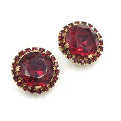 Vintage red glass rhinestone cluster earrings. These are well constructed costume pieces likely made circa 1960s.  Unmarked/unsigned. Some light wear to the gold finish on the back but still in good wearable condition.  Measures: 1" Diameter Weighs: 22 grams Please feel free to contact me with questions and/or for additional photos. More rhinestones in the shop: Stepped red rhinestone necklace - https://basefare.etsy.com/listing/1741038652 Schreiner statement brooch - https://basefare.etsy.com/listing/1752879329 *Free Domestic Shipping on Orders Over $35* Domestic orders ship USPS Ground Advantage. If you would like to add insurance please reach out before purchase. All of our items are in good, vintage condition because of their past lives expect some minor surface abrasions and small chi Red Clip-on Earrings For Wedding, Luxury Red Clip-on Earrings For Evening, Vintage Red Clip-on Earrings For Anniversary, Vintage Red Rhinestone Jewelry, Luxury Vintage Red Clip-on Earrings, Statement Brooch, Red Rhinestone, Rhinestone Jewelry, Cluster Earrings