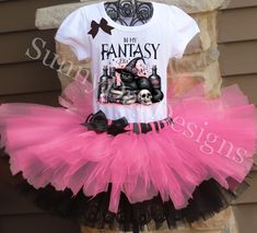 A stunning, pink and black tutu comes with fun, but spooky "In My Fantasy Era" black cat shirt.  A black satin bow is attached to the shirt and tutu.   *Long sleeve shirts are available upon request. All tutus are made with high quality tulle and a 1" non-roll waist band.  I make all my tutus very full and fluffy.  I put as much tulle as I can possibly fit.  The shirt is made with a professional heat press, NOT a home iron.  Personalization is included at no additional cost. Please note, heat pressed shirts may become distressed through wash/wear.  Always wash the shirt inside out on a delicate cycle. The puffy sleeve tee comes in sizes 12 month - size 12 . I also carry the same brand shirt in a tank top style as well as long sleeved.  I also have Carter's bodysuits in sizes newborn - 24 m Fitted Pink Costume For Halloween, Fitted Pink Halloween Costume, Pink Themed Halloween Costume, Themed Black Costumes For Party, Black Themed Party Costumes, Cute Fitted Black Tutu Dress, Black Fitted Tutu Dress, Cute Style, Pink Halloween Tutu Party Dress, Pink Halloween Party Tutu Dress