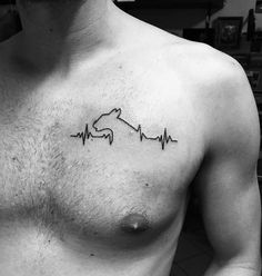 a man with a heartbeat tattoo on his chest