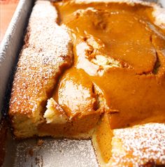 a loaf of pumpkin bread with powdered sugar on top