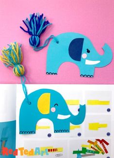 an elephant cut out with construction paper and yarn