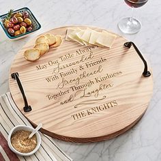 a personalized cheese board with wine and bread