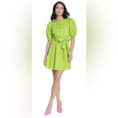 This Adorable Mini Shirtdress Is Florence. We Adore Her Puff Sleeves, Detailed Button Placket And Waist Sash! Cotton Poplin | 98% Cotton 2% Spandex Dress Shown Is A Size 8 - Dress Length From Center Back Neck To Hem Is 35". Machine Wash Cold With Similar Colors Gentle Cycle Only Non-Chlorine Bleach When Needed Reshape, Lay Flat To Dry Warm Iron As Needed Dry Clean Fitted Puff Sleeve Dress With Button Closure For Spring, Spring Mini Puff Sleeve Dress With Button Closure, Fitted Green Cotton Puff Sleeve Dress, Green Fitted Cotton Puff Sleeve Dress, Green Cotton Puff Sleeve Mini Dress, Green Puff Sleeve Cotton Mini Dress, Green Cotton Mini Dress With Puff Sleeves, Summer Puff Sleeve Dress With Buttons For Work, Green Cotton Mini Dress For Work