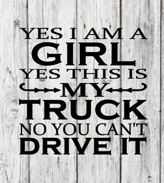 a wooden wall with the words yes i am a girl, yes this is my truck no you can't drive it