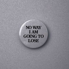 a button that says, no way i am going to lose on the side of a wall