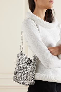 Just as iconic and covetable today, you can chalk Rabanne's '1969' signatures all the way back to their hallmark year. This shoulder bag is crafted from signature silver-tone chainmail and made up of intricately overlapping discs, strung on generous straps. There's enough space for essential cosmetics and your cell phone. A Cell, Chain Mail, Paco Rabanne, Chain Shoulder Bag, White Bag, Pink Bag, Women Collection, Leather Shoulder Bag, Hallmark