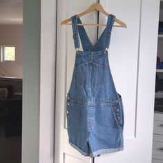 Never Worn, Adjustable Straps, Cuffed Shorts Blue Short Length Overalls For Summer, Blue Short Summer Overalls, Blue Short-length Summer Overalls, Blue Short Length Summer Overalls, Light Wash Overall Bottoms With Pockets, Blue Cotton Shortalls, High Waist Blue Shortalls With Pockets, Shorts Overalls, Cuffed Shorts