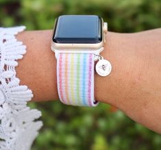 These gorgeous custom watch bands are the perfect arm candy for your Apple Watch! Choose between primary and pastel rainbow and you're ready to go! The pastel rainbow band features an adjustable closure while the primary band features a traditional adjustable closure. **These bands fit 38mm/40mm Apple Watch faces ONLY-PLEASE ensure that this will fit your watch before checkout as we do not accept returns or exchanges. These are ONE SIZE to fit an average sized wrist, but it does have an adjustab Adjustable Multicolor Watch Bands As Gift, Adjustable Multicolor Watch Band As Gift, Adjustable White Apple Watch Band For Everyday, White Adjustable Watch Accessories For Everyday Use, Adjustable Pink Apple Watch Band For Everyday Use, Multicolor Adjustable Watch Bands For Everyday Use, White Bracelet Strap Apple Watch Band For Everyday Use, Adjustable Personalized White Watch Bands, Personalized Adjustable White Watch Bands