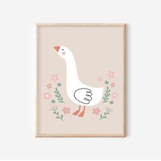 a white duck with pink flowers and leaves on it