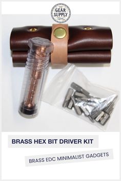 the brass hex bit driver kit is in its leather case and it's packaged with some metal gadgets