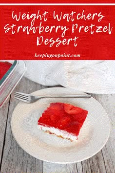 a white plate topped with a slice of strawberry pretzel dessert