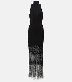 Zare fringed ribbed-knit maxi dress in black - Khaite | Mytheresa Evening Ribbed Long Maxi Dress, Fitted Maxi Dress With Tassels For Evening, Elegant Fitted Maxi Dress With Tassels, Evening Bodycon Ribbed Maxi Dress, Party Ribbed Maxi Dress, Chic Evening Ribbed Maxi Dress, Evening Midi Dress With Tassels, Chic Evening Maxi Dress With Ribbed Details, Chic Maxi Dress With Tassels