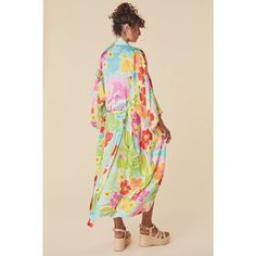 Our Margi Hour Maxi Robe In Tutti Fruiti Is Dripping In Vacay Glam. Crafted In Our Uber Soft, Liquid Like Fabrication This One Feels Incredible On The Skin And Adds A Pop Of Colour To Your Everyday Fit. Featuring Our Hand Drawn Margi Hour Print, This Piece Is Unique And Endlessly Versatile. A Travel Essential, We See Our Robe Worn Poolside For Effortlessly Chic Styling Or With Your Cami And Denim Whilst Exploring Beach Streets In A Land Far Away. Dreamy And Oh So Striking, We Know This One Is Su Multicolor Floral Print Sleepwear For Spring, Spring Floral Print Multicolor Sleepwear, Spring Multicolor Floral Print Sleepwear, Multicolor Spring Sleepwear, Spring Multicolor Sleepwear, Bohemian V-neck Spring Sleepwear, Bohemian V-neck Sleepwear For Spring, Bohemian Multicolor Sleepwear For Spring, Multicolor Kimono For Summer Loungewear