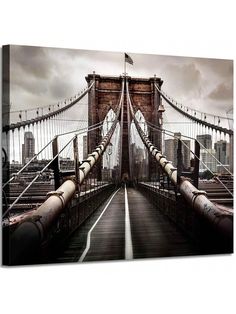 an old photo of the brooklyn bridge in new york city