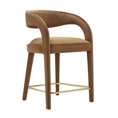 an upholstered chair with gold legs and a tan seat cushion on the back