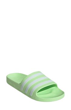 A comfortable pair of slide sandals feature a contoured footbed for support..Open toe.Slip-on style.EVA upper and sole.Imported.Item #6612524 Adidas Slides For Swimming, Comfortable Green Slide Slippers, Adidas Slides For Swimming In Summer, Adidas Slides For Summer Swimming, Comfortable Green Flat Flip Flops, Green Comfortable Flat Flip Flops, Comfortable Green Synthetic Slippers, Spring Poolside Slip-on Slides, Green Flip Flops With Arch Support For Summer