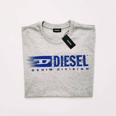 DIESEL T-SHIRT BRAND NEW WITH TAGS AND IN ORIGINAL PACKAGING  Vintage Grey Diesel T Shirt / Diesel Tee / Diesel Top.  Diesel Logo Graphic Detailing On Chest   Female Women's Size US 8 And US 10 Available - RELAXED FITTING  FULLY TRACKABLE SHIPPING SERVICE UK AND WORLDWIDE SHIPPING Urban Cotton Top With Logo, Cotton Crew Neck Shirt With Logo, Gray Cotton T-shirt With Logo Print, Gray Cotton Shirt With Logo Print, Casual Gray Logo Tops, Casual Gray Tops With Logo, Diesel Shirt, Diesel Vintage, Diesel Top